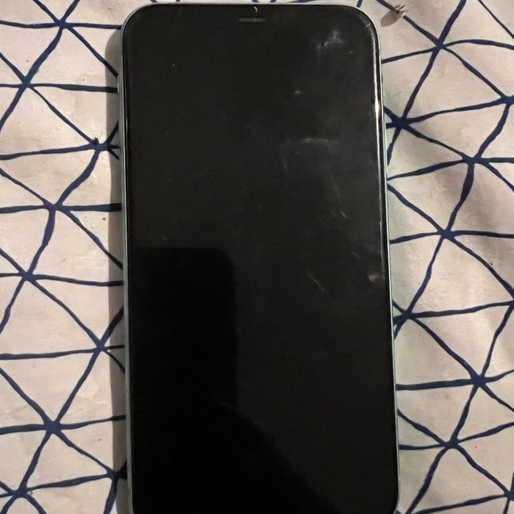 iPhone 11  it has A cracked back  volume Low but It’s Unlocked Work Real Good